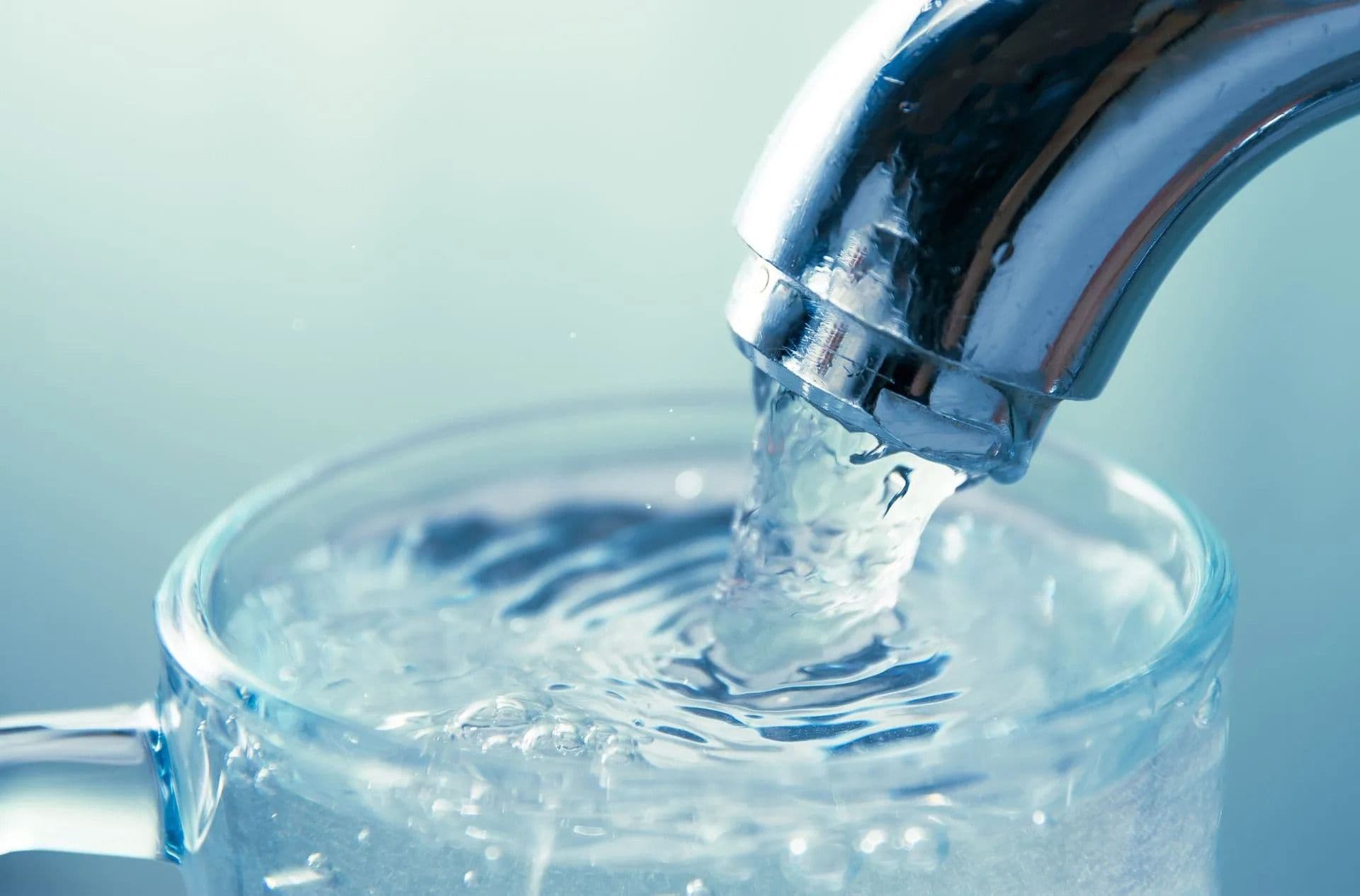 faucet pouring clean water